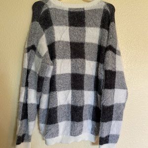 Along black and white sweater